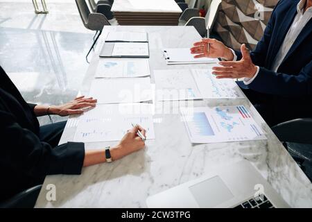 Business people analyzing charts Stock Photo