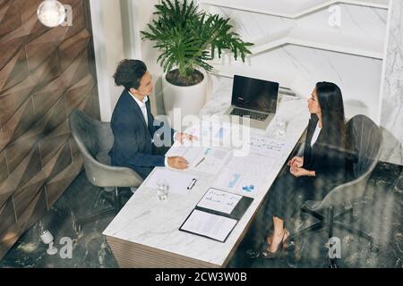 Discussing company development Stock Photo