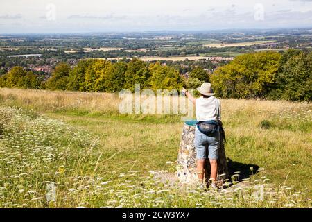 Woman at the viewpoint on the Ridgeway national  long distance trail  footpath at Brush Hill above Princes Risborough Chilterns  Buckinghamshire Stock Photo