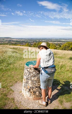 Woman at the viewpoint on the Ridgeway national  long distance trail  footpath at Brush Hill above Princes Risborough Chilterns  Buckinghamshire Stock Photo