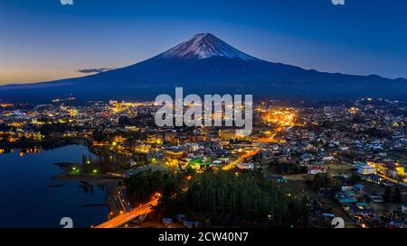 Fuji mountains and Fujikawaguchiko city at night, Japan. Stock Photo