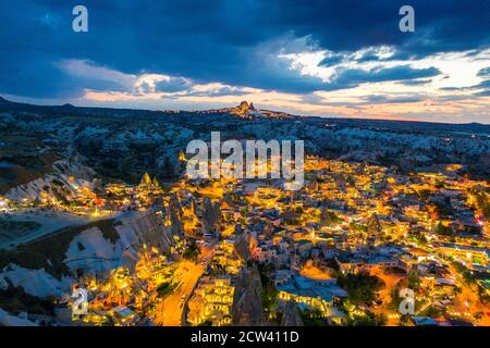 Goreme town at twilight in Cappadocia, Turkey. Stock Photo