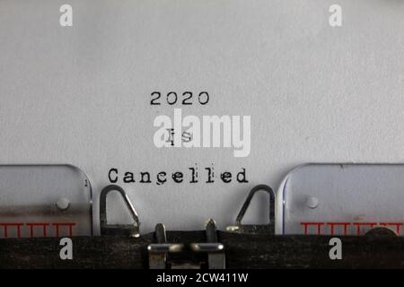 written on old typewriter with text 2020 is cancelled. Covid-19,  Coronavirus, 2020 is Cancelled Stock Photo