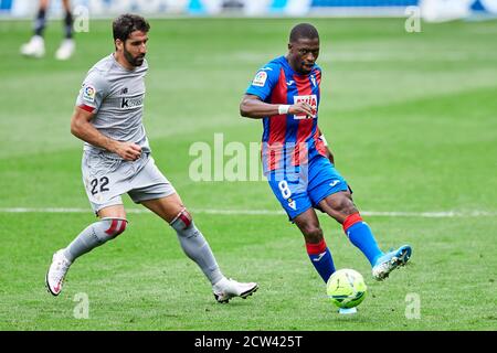 Eibar, Spain. 27th Sep, 2020. Papakouli Diop of SD Eibar and Raul Garcia of Athletic Club during the La Liga match between SD Eibar and Athletic Club played at Ipurua Stadium on September 27, 2020 in Eibar, Spain. (Photo by Ion Alcoba/PRESSINPHOTO) Credit: Pro Shots/Alamy Live News Stock Photo
