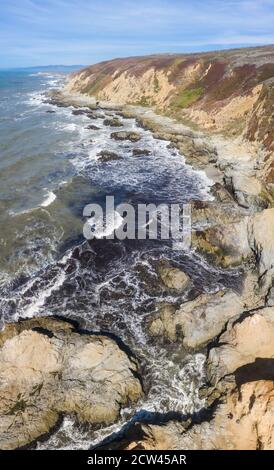 The Pacific Ocean crashes against the rugged and scenic seashore of Northern California. This beautiful region has incredible coastal landscapes. Stock Photo