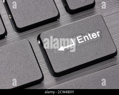 Closeup enter key on computer keyboard Stock Photo