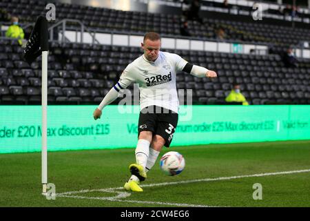 Wayne Rooney of Derby County takes a corner kick during the FA Cup ...