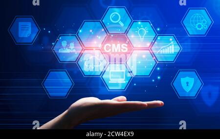 CMS pictograms over male hand, collage. Content management system, social media administration, webpage optimization Stock Photo