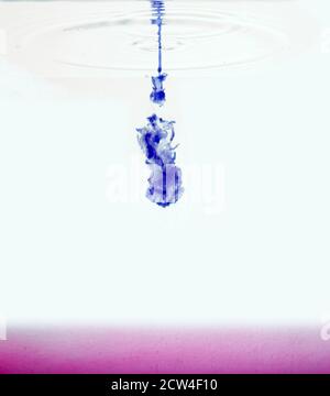 Ink dissolving in water Stock Photo - Alamy