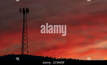 Beautiful Clouds in this Cell Tower Sunrise Landscape. Oregon, Ashland, Cascade Siskiyou National Monument, Fall Stock Photo