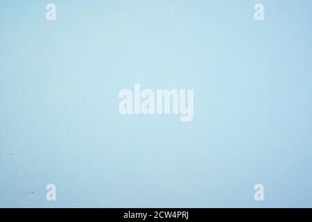 Pale blue concrete background with visible texture, top view. Stock Photo