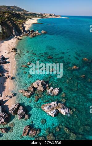 Aerial view of rocks in the sea. Seabed seen from above, transparent water. Pristine beaches. Blue flags. Seabed. Parghelia, Tropea, Calabria. Italy Stock Photo