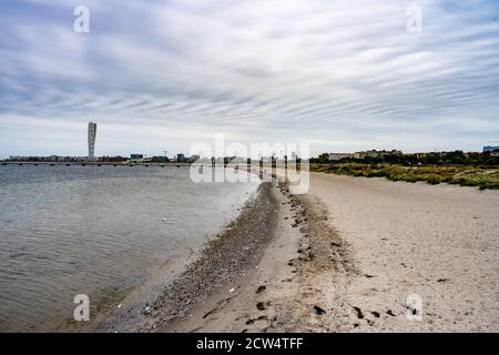 An awesome beach close to the city center of Malmo, Sweden. Blue sky and patchy clouds in the background Stock Photo