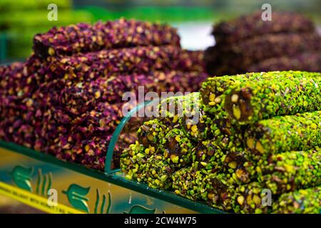 Various turkish delights sweets baklava lokum and dried fruits on market Stock Photo