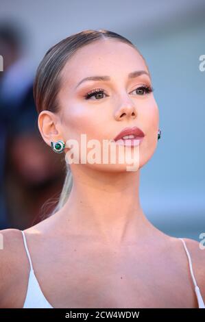 Ester Exposito poses on the red carpet during the 77th Venice Film