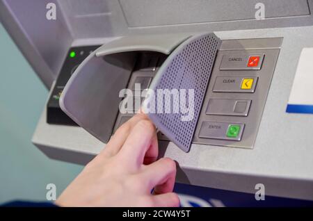 Close-up of hand entering PIN/pass code on ATM/bank machine keypad Stock Photo