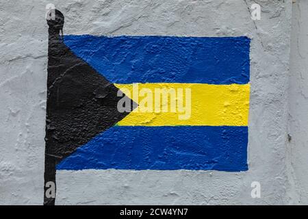 Childish style drawing, of the flag of Bahamas, painted on a wall. Stock Photo