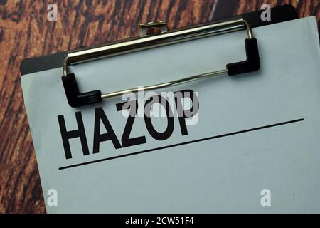 Hazop write on a paperwork isolated on office desk. Stock Photo