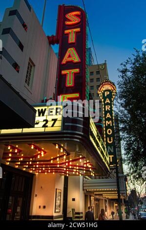 Austin, TX--Jan 9, 2019; illuminated neon sign and box offices of the iconic state and paramount theaters in downtown known as historic music venues i Stock Photo