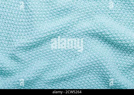 Mint knitting wool texture background Crocheted fabric texture Stock Photo