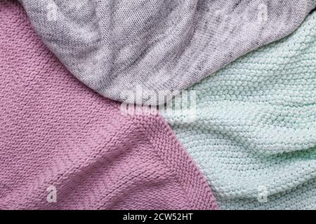 Gray, mint and lilac knitting wool texture background Crocheted fabric texture Stock Photo