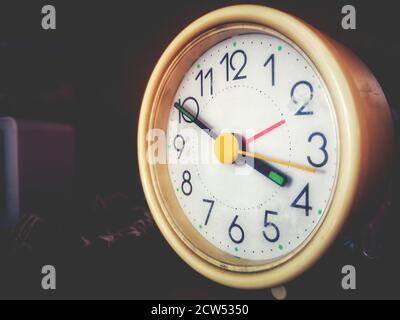 alarm clock - A vintage alarmclock in a faded background with copy space Stock Photo