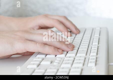 Man hands typing on computer keyboard, business man working on pc in office. Close-up - Image Stock Photo