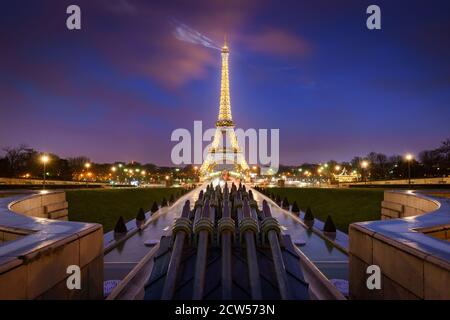 The Eiffel Tower illuminated at night with light beams. Trocadero, Champs-de-Mars, Paris Stock Photo