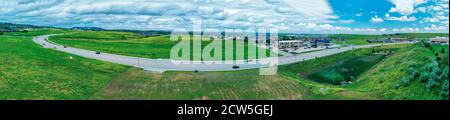 Panoramic aerial view of road in the countryhouse. Stock Photo