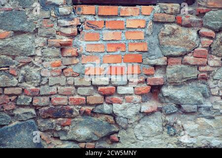 Wall was built from reclaimed bricks Stock Photo