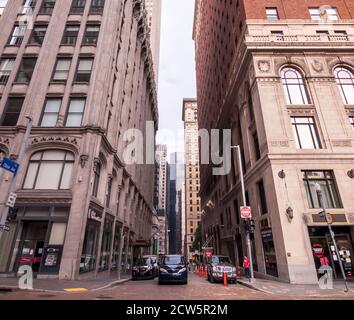 Traffic on Oliver Avenue at the intersection with Grant Street in downtown Pittsburgh, Pennsylvania, USA Stock Photo