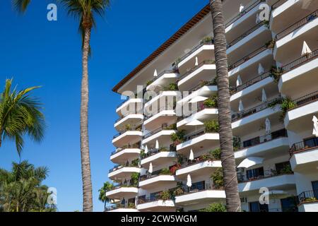 Luxury condominiums and apartments on Playa De Los Muertos beach and pier close to famous Puerto Vallarta Malecon, the city largest public beach Stock Photo