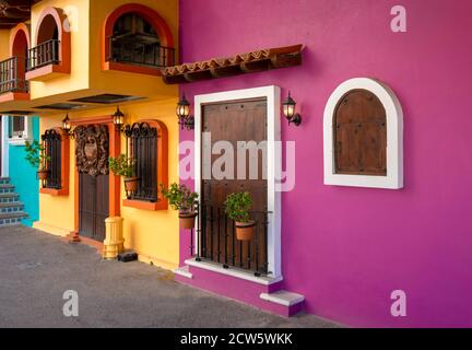 Restaurants and cafes with ocean views on Playa De Los Muertos beach and pier close to famous Puerto Vallarta Malecon, the city largest public beach Stock Photo