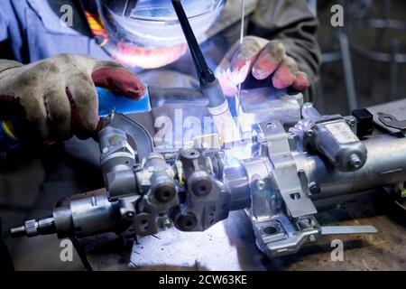 TIG welding of aluminum part for a passenger car Stock Photo