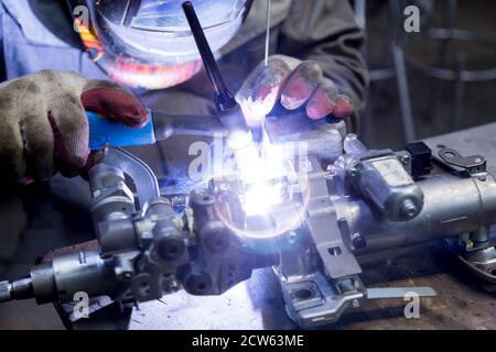 TIG welding of aluminum part for a passenger car Stock Photo