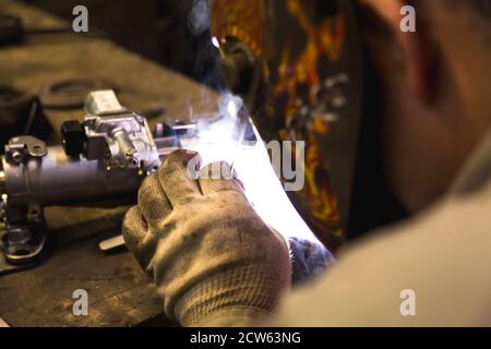 TIG welding of aluminum part for a passenger car Stock Photo