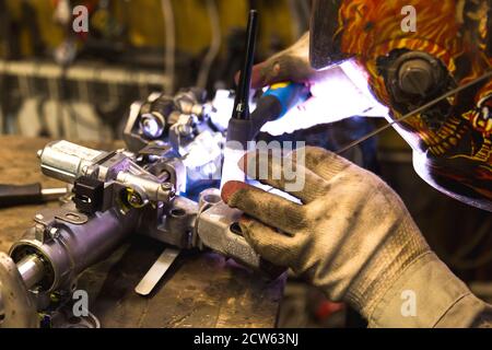 TIG welding of aluminum part for a passenger car Stock Photo