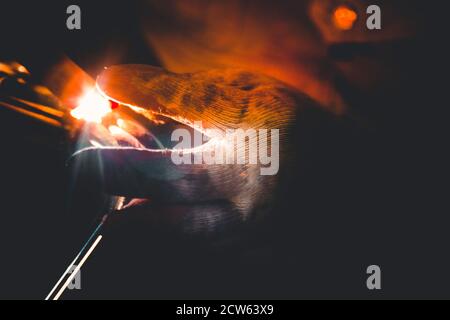 TIG welding of polished stainless steel pipe Stock Photo