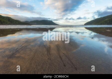 Amazing refletion on San Josef Bay beach in Cape Scott Provincial Park on Vancouver Island, British Columbia, Canada. Stock Photo