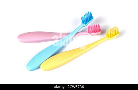 Set of colorful toothbrushes isolated over white Stock Photo