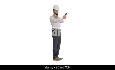 Man engineer wearing protecting safety helmet and shirt making v Stock Photo