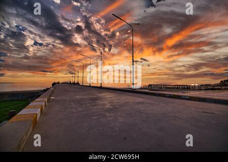 Sunrise on the pier in Thailand Stock Photo