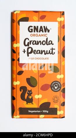 Bar of Gnaw Vegetarian Organic Milk Chocolate. Granola & Peanut. Stock Photo