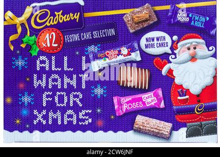 Cadbury festive cake selection for Christmas set on white background - festive cake selection all I want for Xmas Stock Photo