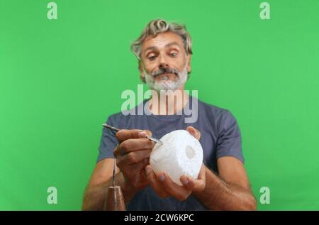 Hand processing stone craftsman at work Stock Photo