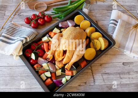 Roast chicken with oven vegetables mediterranean dish Stock Photo