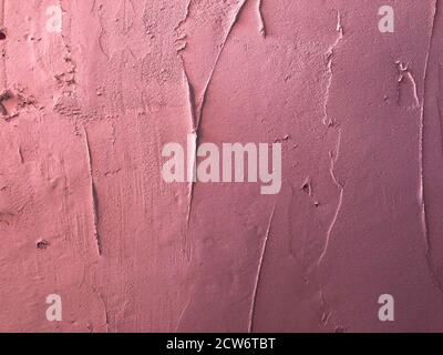 Textured magenta colored plaster. Wall stucco texture. Plastered background Stock Photo