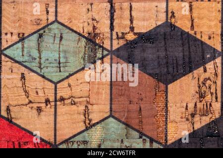 Colorful Cork background texture. A high-resolution closeup of a detail from colored printed cork pattern with a seal of transparent paint. Beautiful Stock Photo