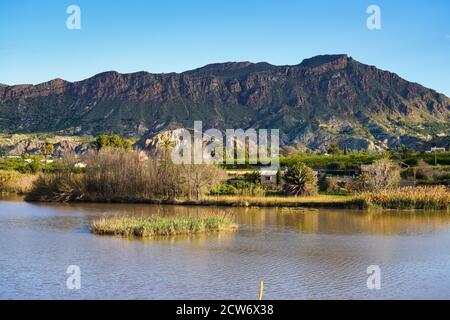 The Ojos reservoir, also called Azud de Ojos in Blanco, Region of Murcia. Spain. River Segura. Ricote Valley. Seen from the viewing platform of Alto d Stock Photo