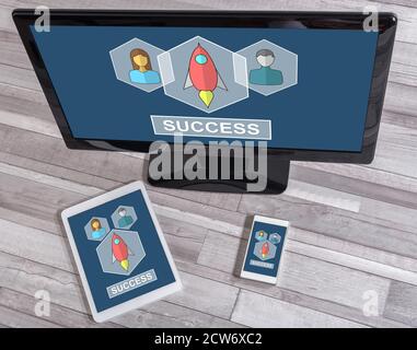 Business success concept shown on different information technology devices Stock Photo
